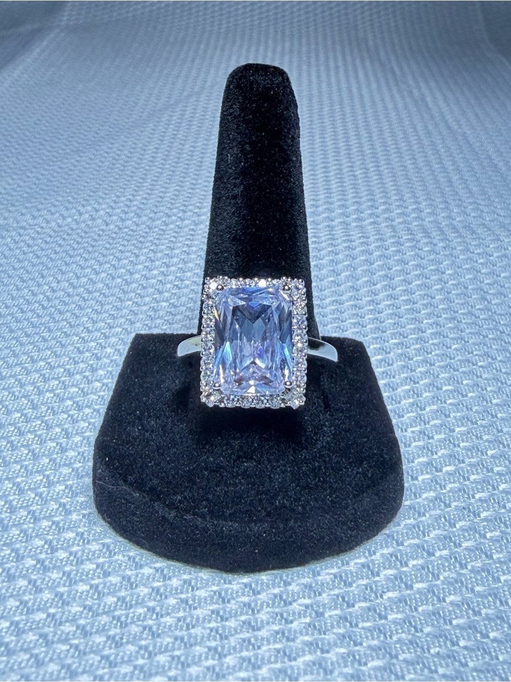 Silver Ring w/Pale Blue Rectangular Center Stone & Halo
